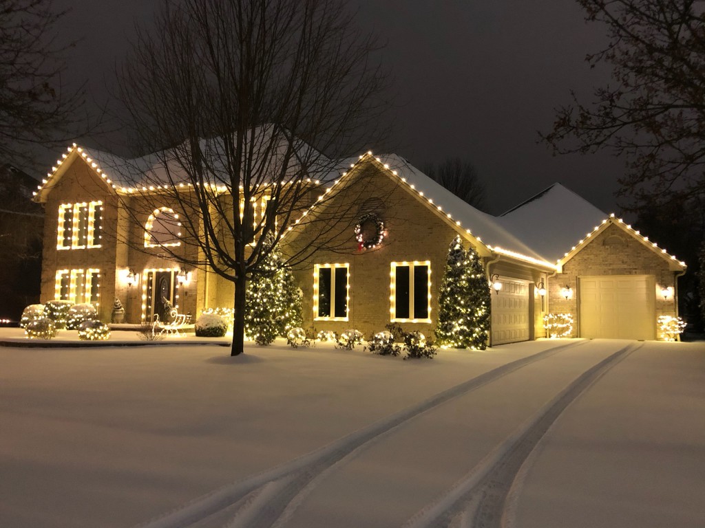 Warm white professional roofline Christmas lighting